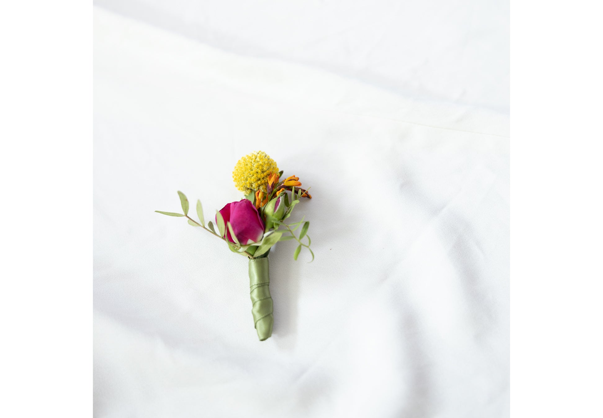Close-up of Boutonnière in Hidcote Brights