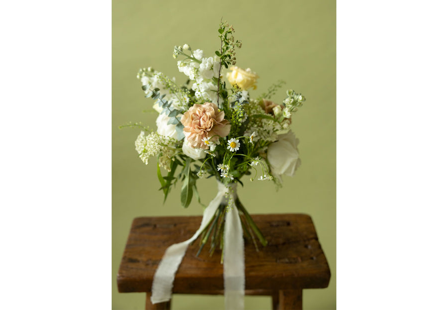 Bridesmaids' Bouquet in Sissinghurst White on wooden table