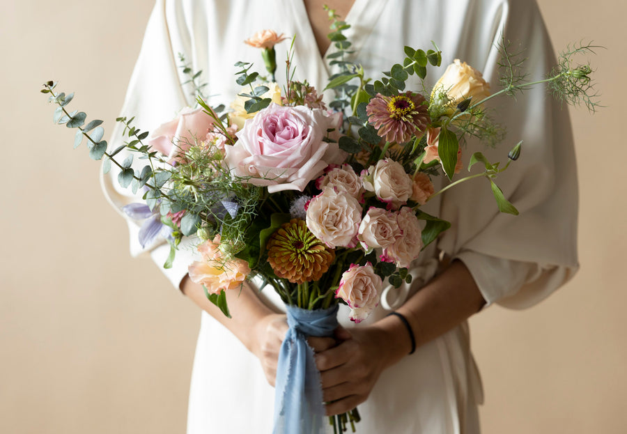 A Lady Hold Bridal Bouquet in Great Dixter Pastels