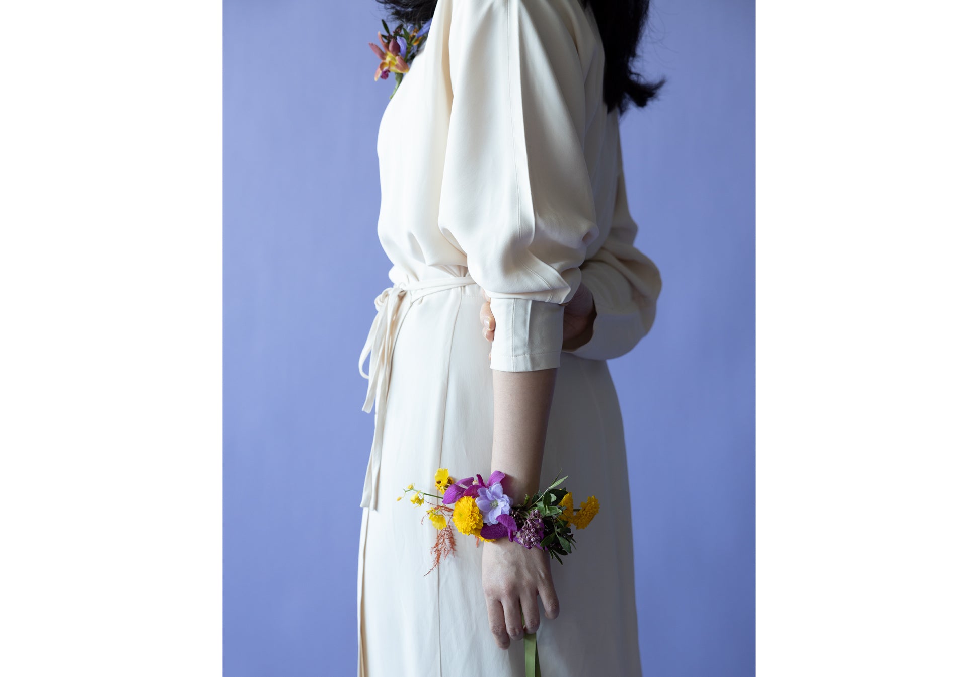 A Lady with Wrist Corsages in Hidcote Brights