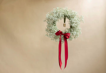 A Snowman in a Wreath