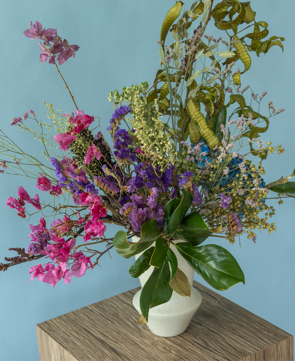 Long-lasting dried floral arrangement in a ceramic vase by Charlotte Puxley Flowers Singapore