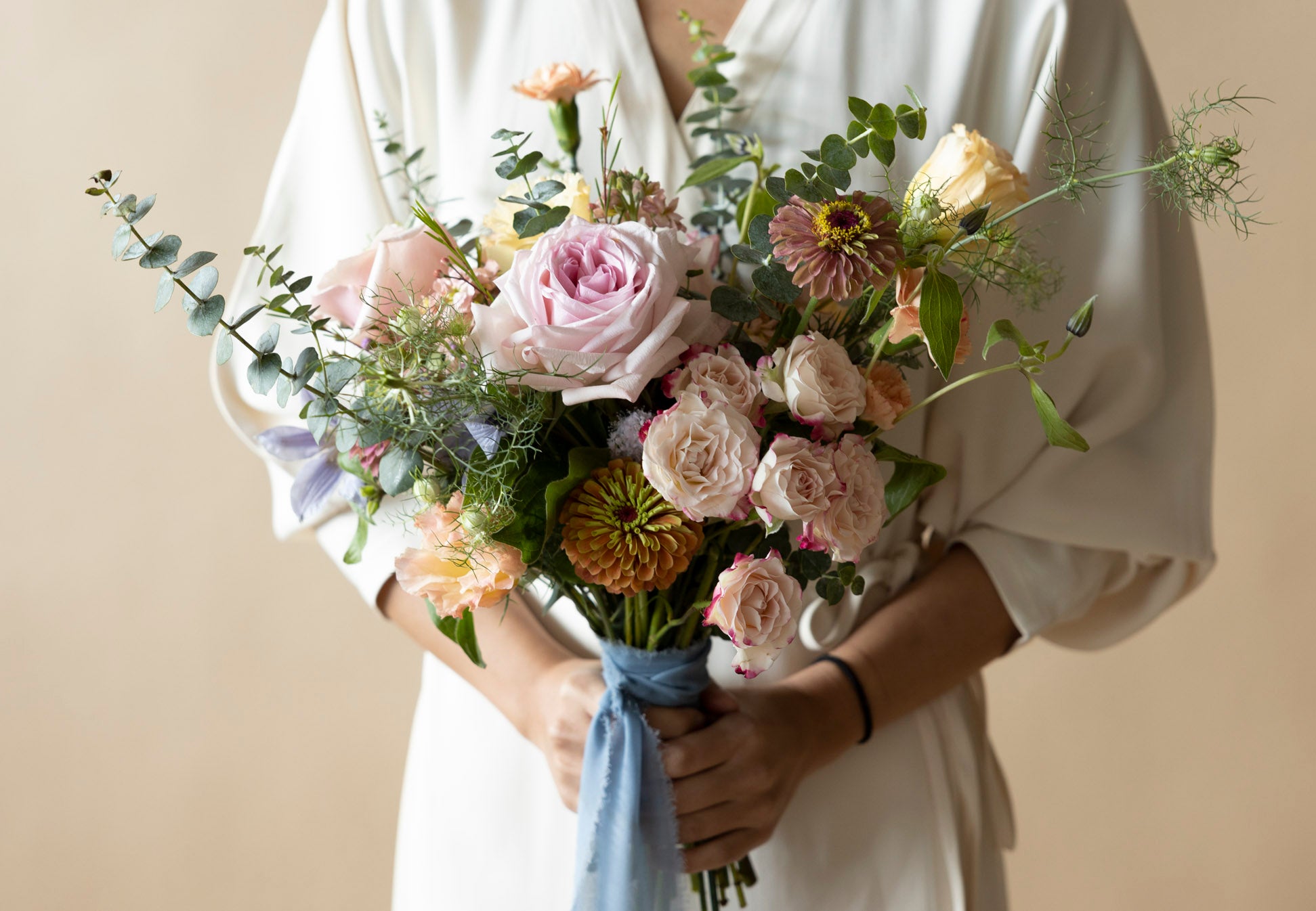 A Lady Hold Bridal Bouquet in Great Dixter Pastels