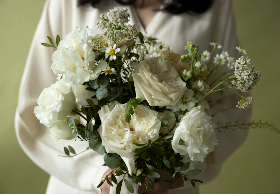 A Lady with Bridal Bouquet in Sissinghurst White
