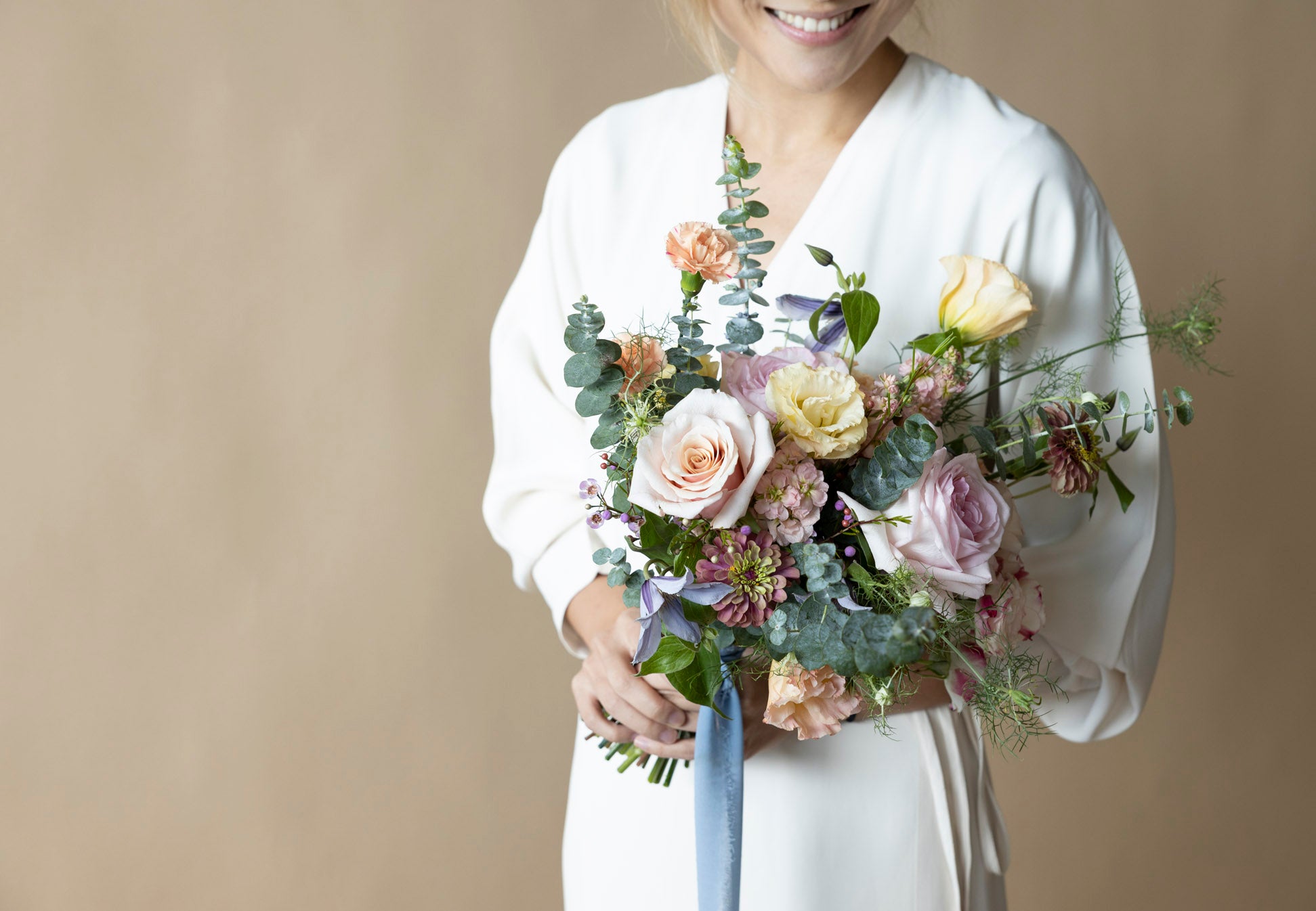 A Lady with Bridal Bouquet in Great Dixter Pastels