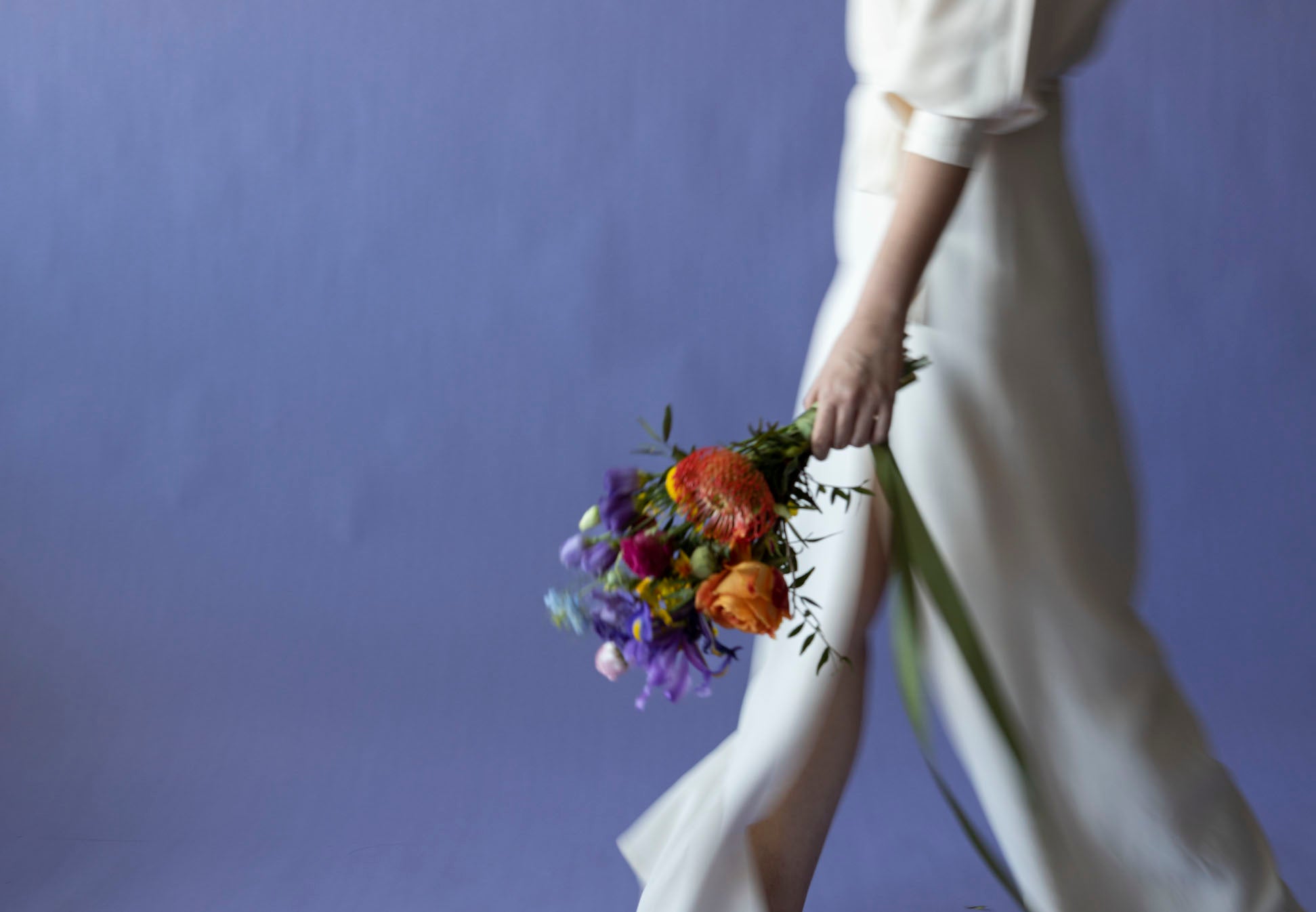A lady hold Bridesmaids' Bouquet in Hidcote Brights
