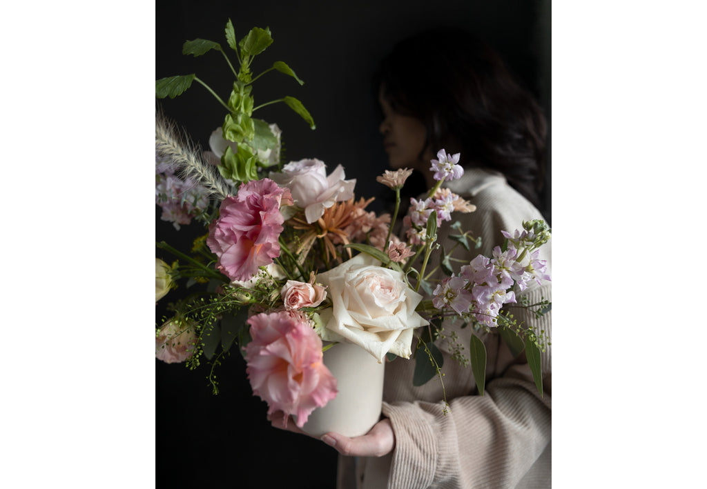 A Lady Hold A Our Daughters Vase