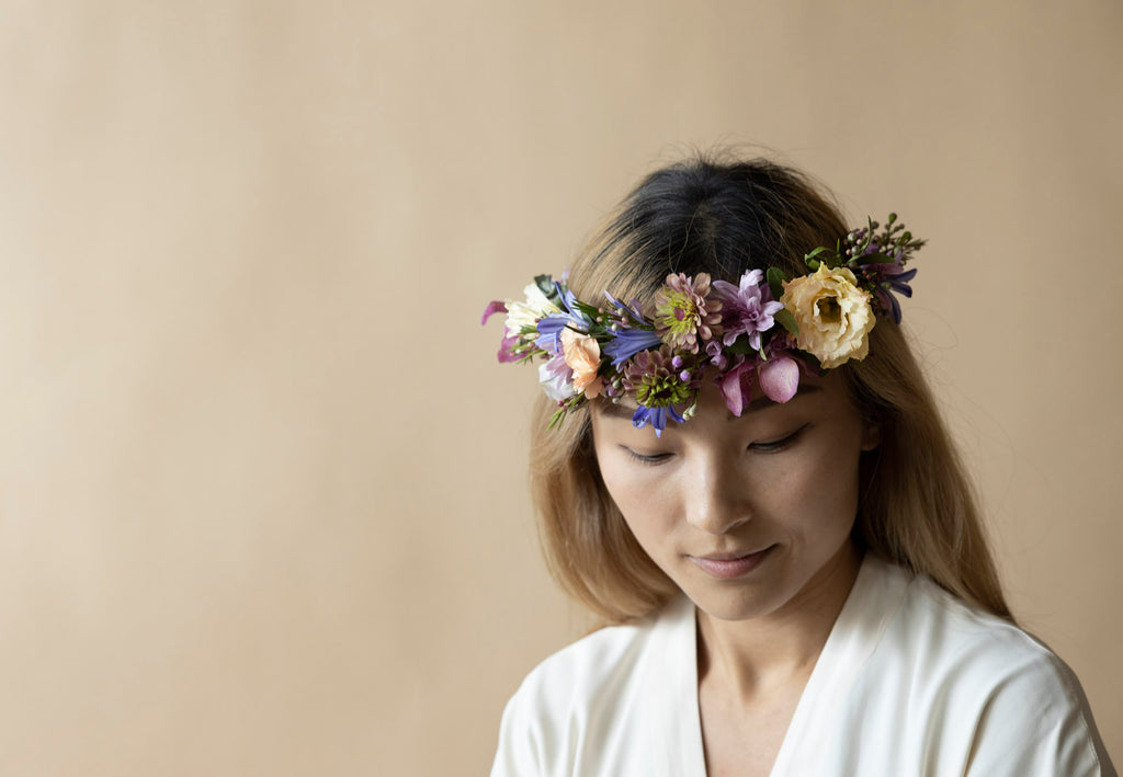 A Lady with Floral Crowns in Great Dixter Pastels