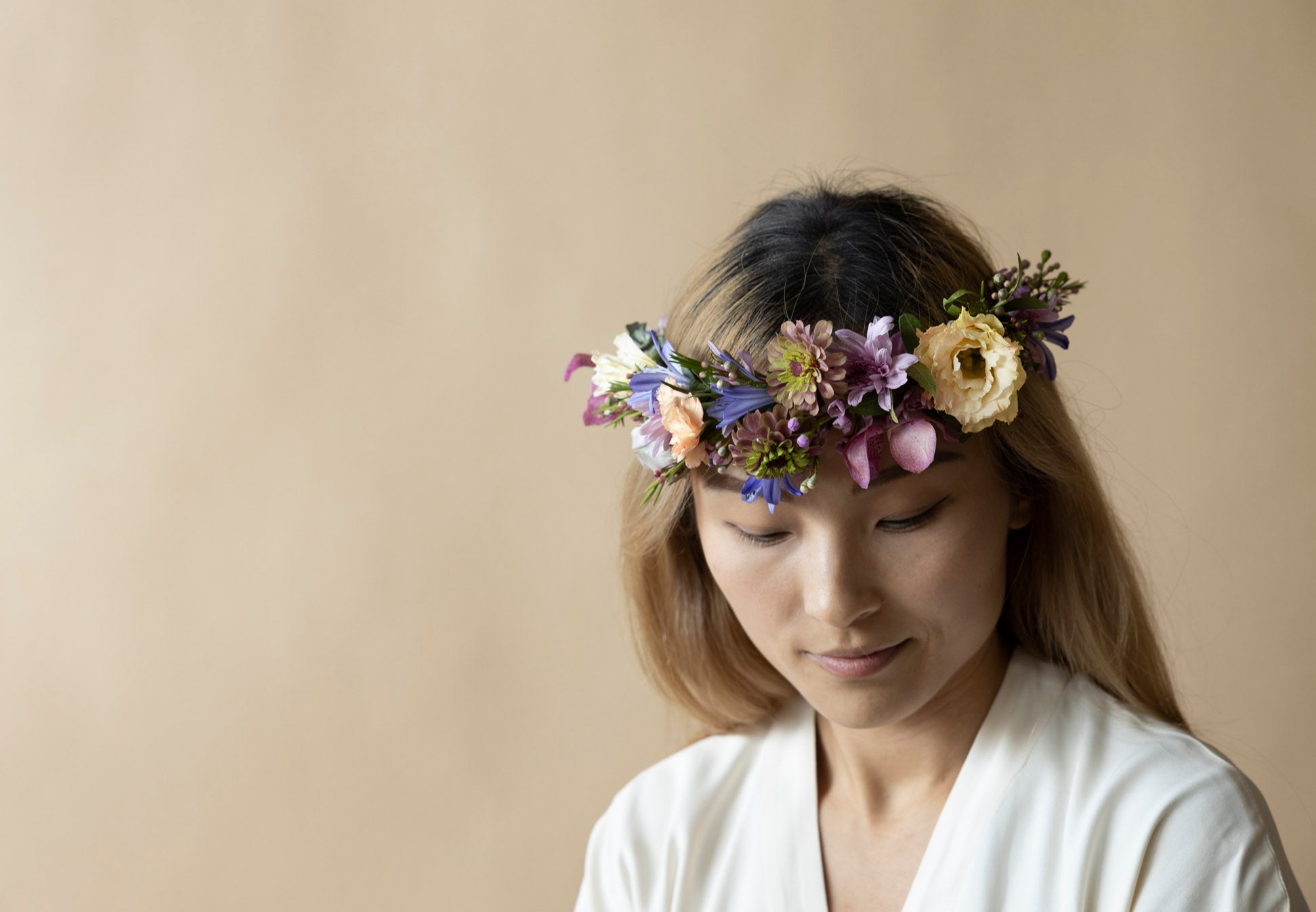 A Lady with Floral Crowns in Great Dixter Pastels