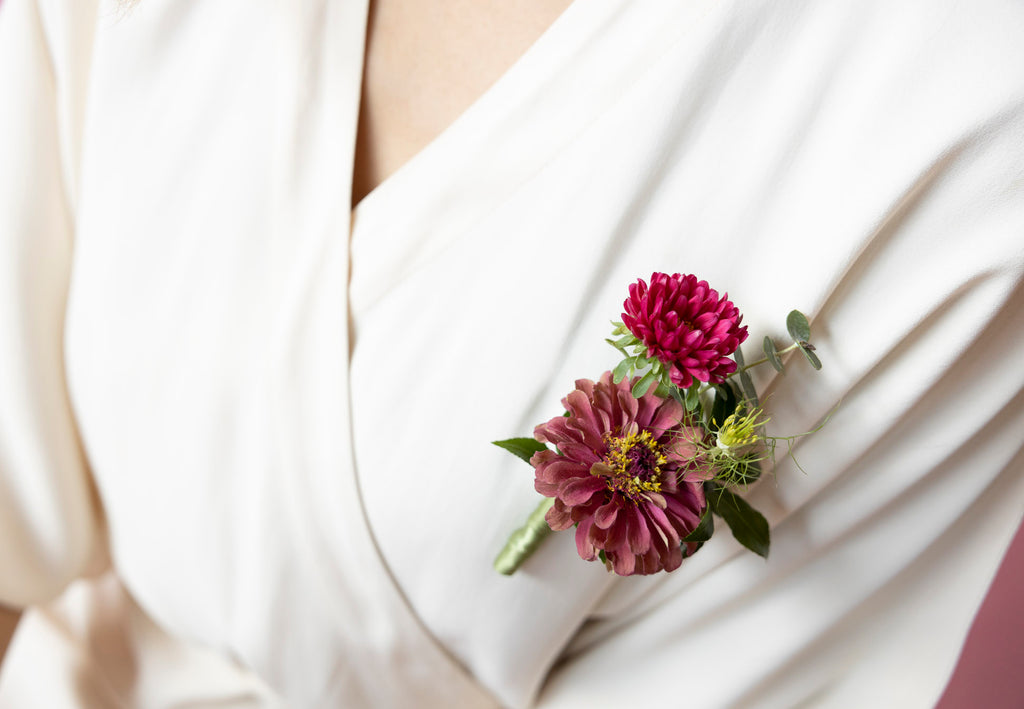 Boutonnière in Hampton Court Reds