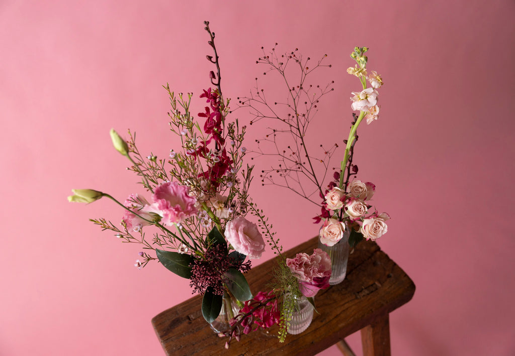 Bud Vases in Hampton Court Reds on wooden chair
