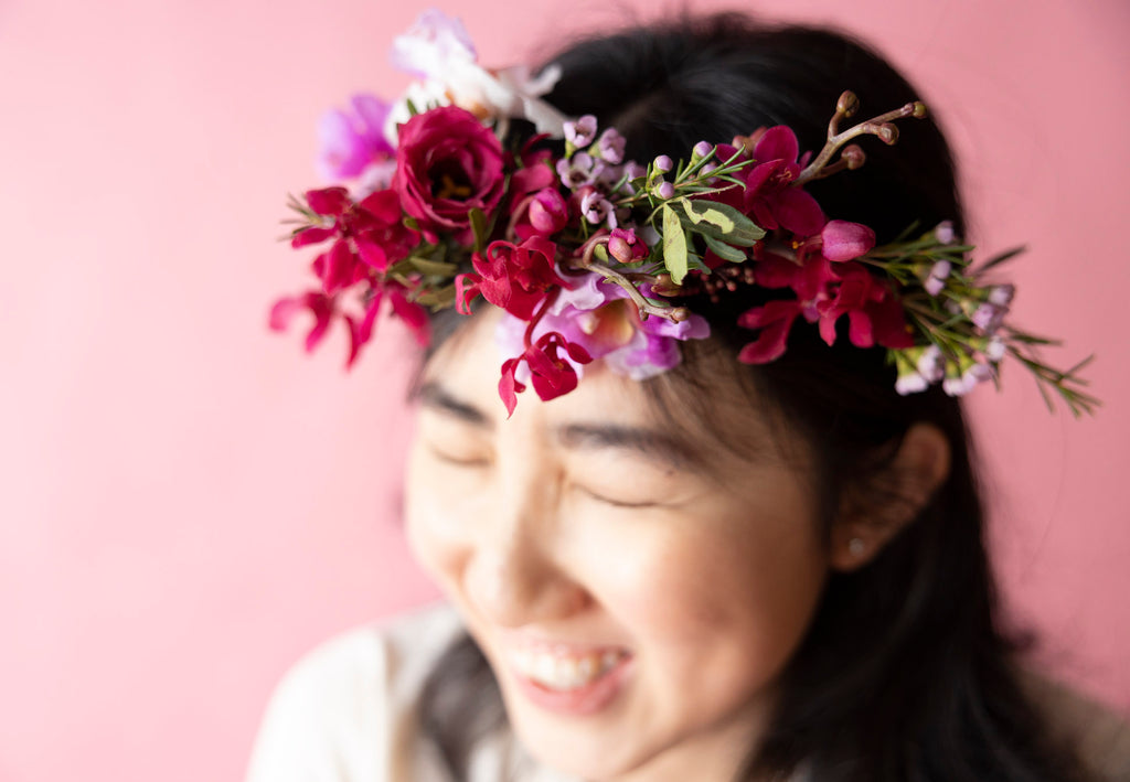 A Lady wear Floral Crown in Hampton Court Reds