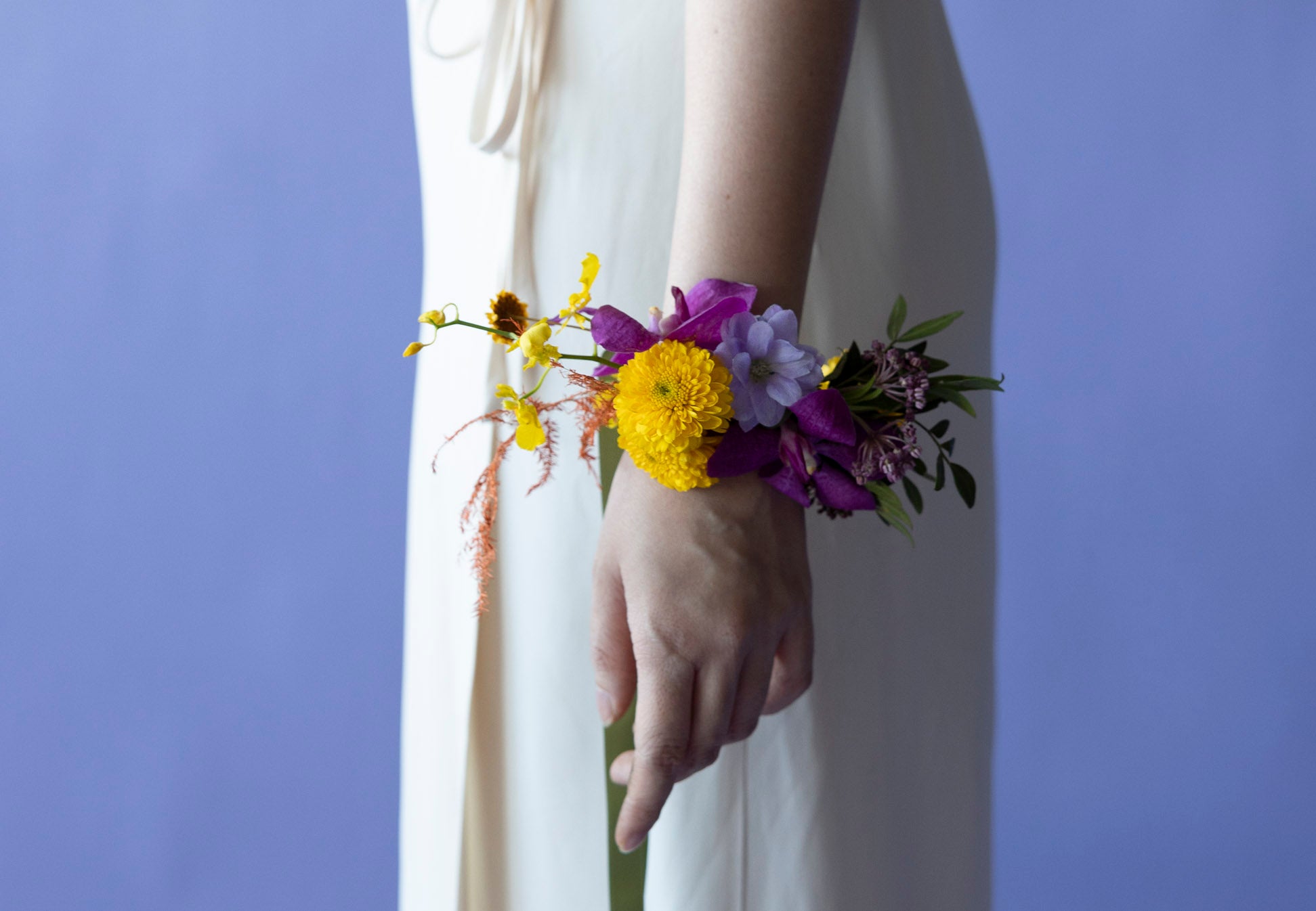 Wrist Corsages in Hidcote Brights on hand