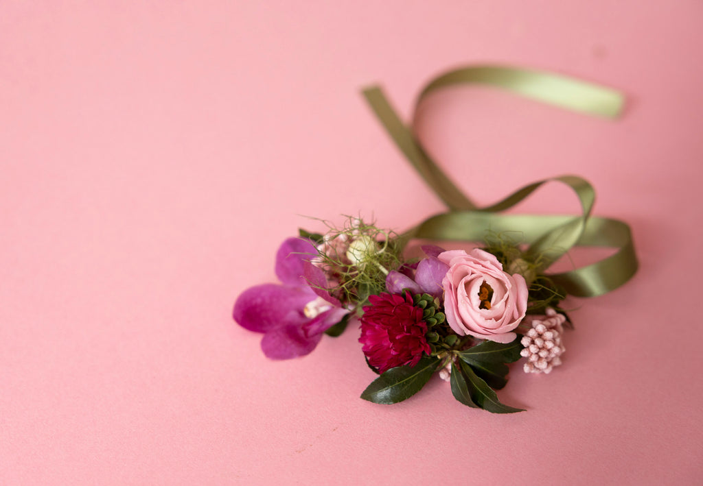 Wrist Corsages in Hampton Court Reds closeup